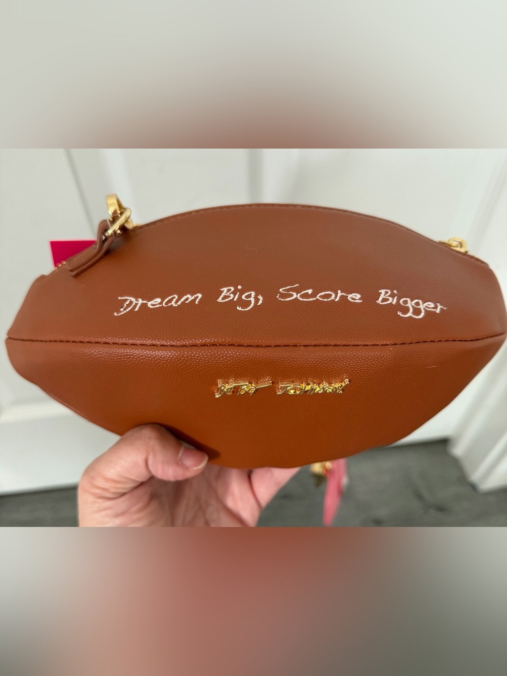 Brown Football-Shaped Crossbody Bag with Pink Striped Strap - Betsey Johnson - Picture 3 of 5